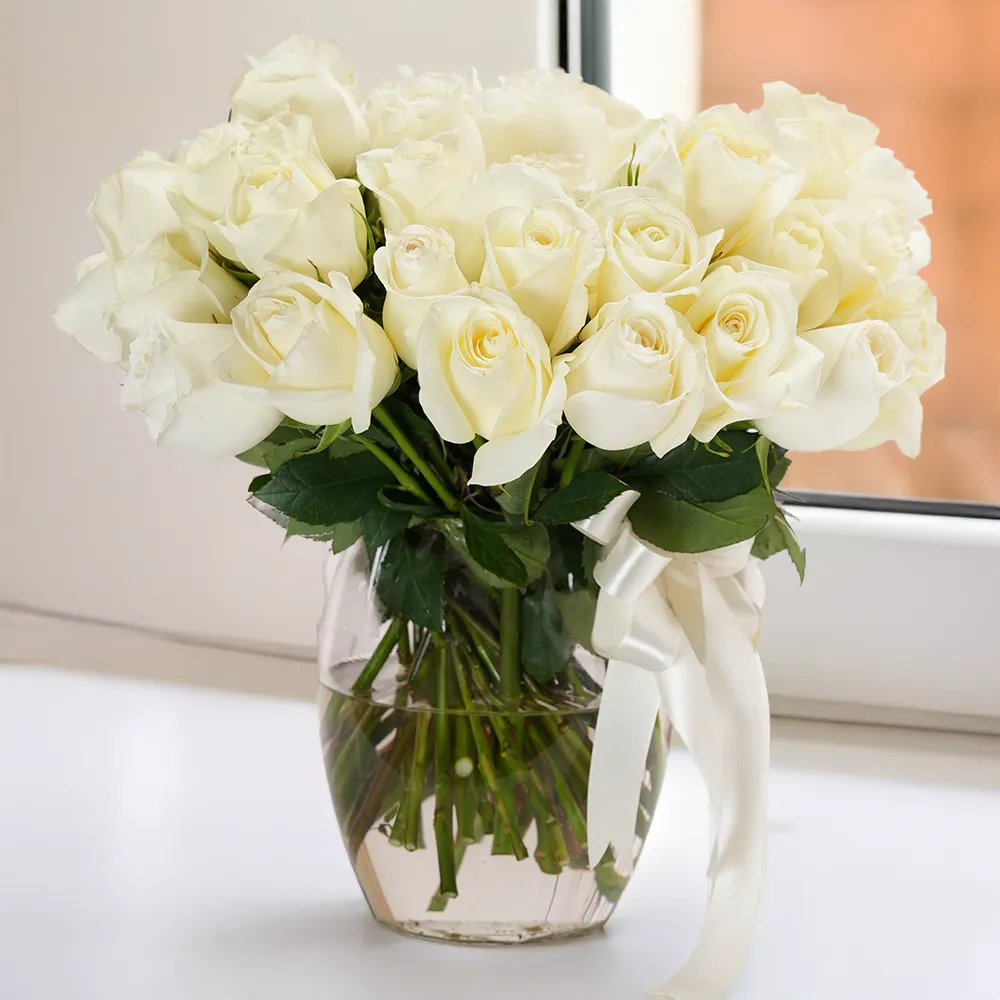 Celebrate Love with 50 White Roses in a Glass Vase