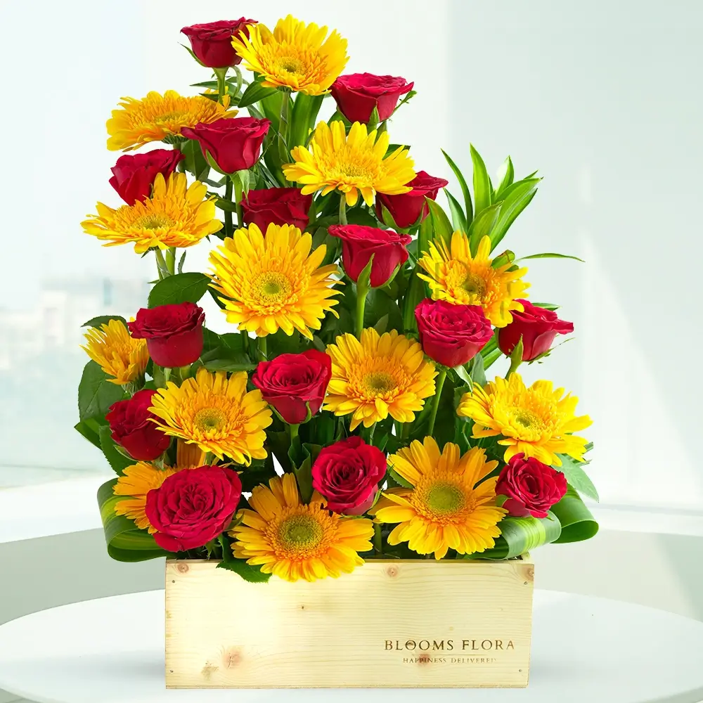wooden box of 15 red roses and 13 yellow gerberas