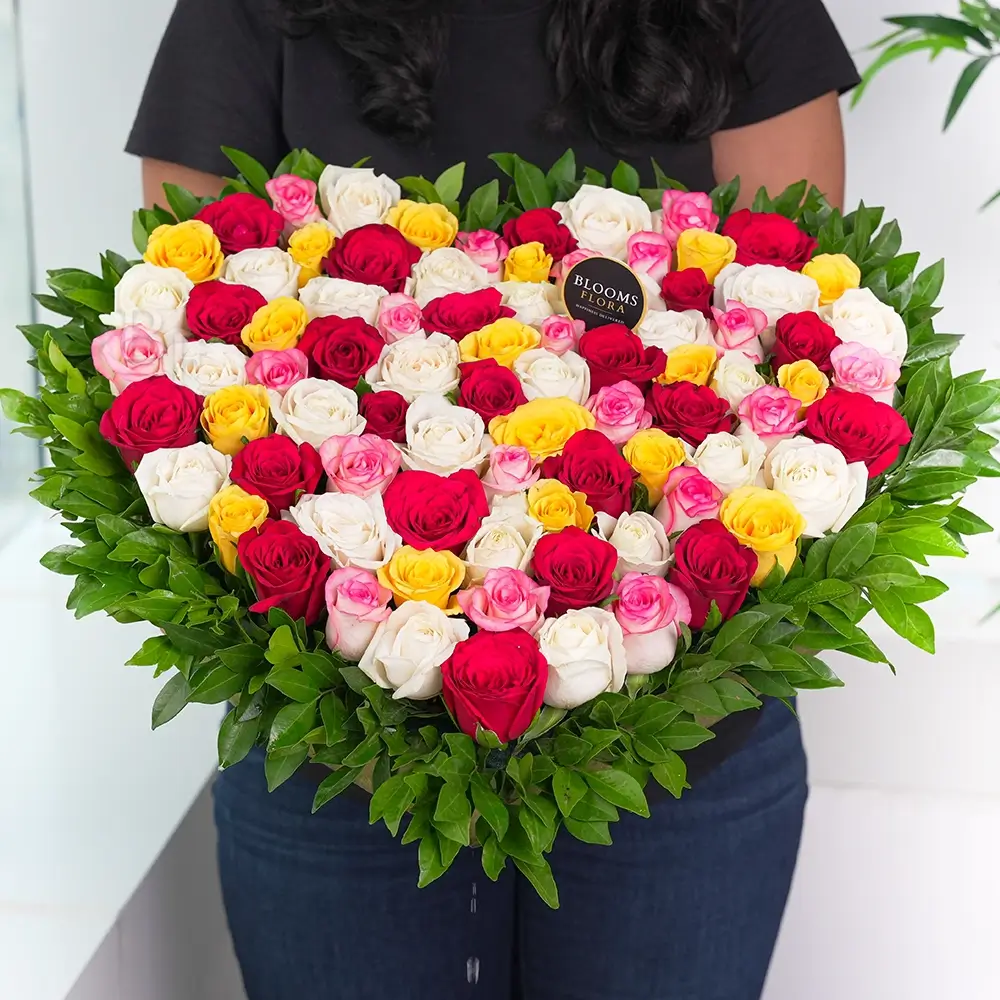 50 mixed roses heart shape arrangement in pink, yellow, white and red – romantic anniversary and Valentine's Day gift, same-day delivery India