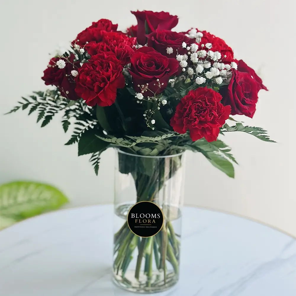 vase of 10 red roses and 10 red carnations
