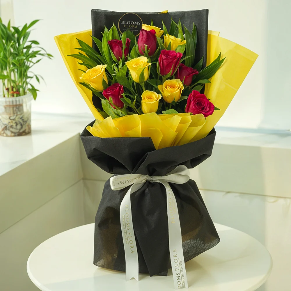 12 red and yellow roses bouquet