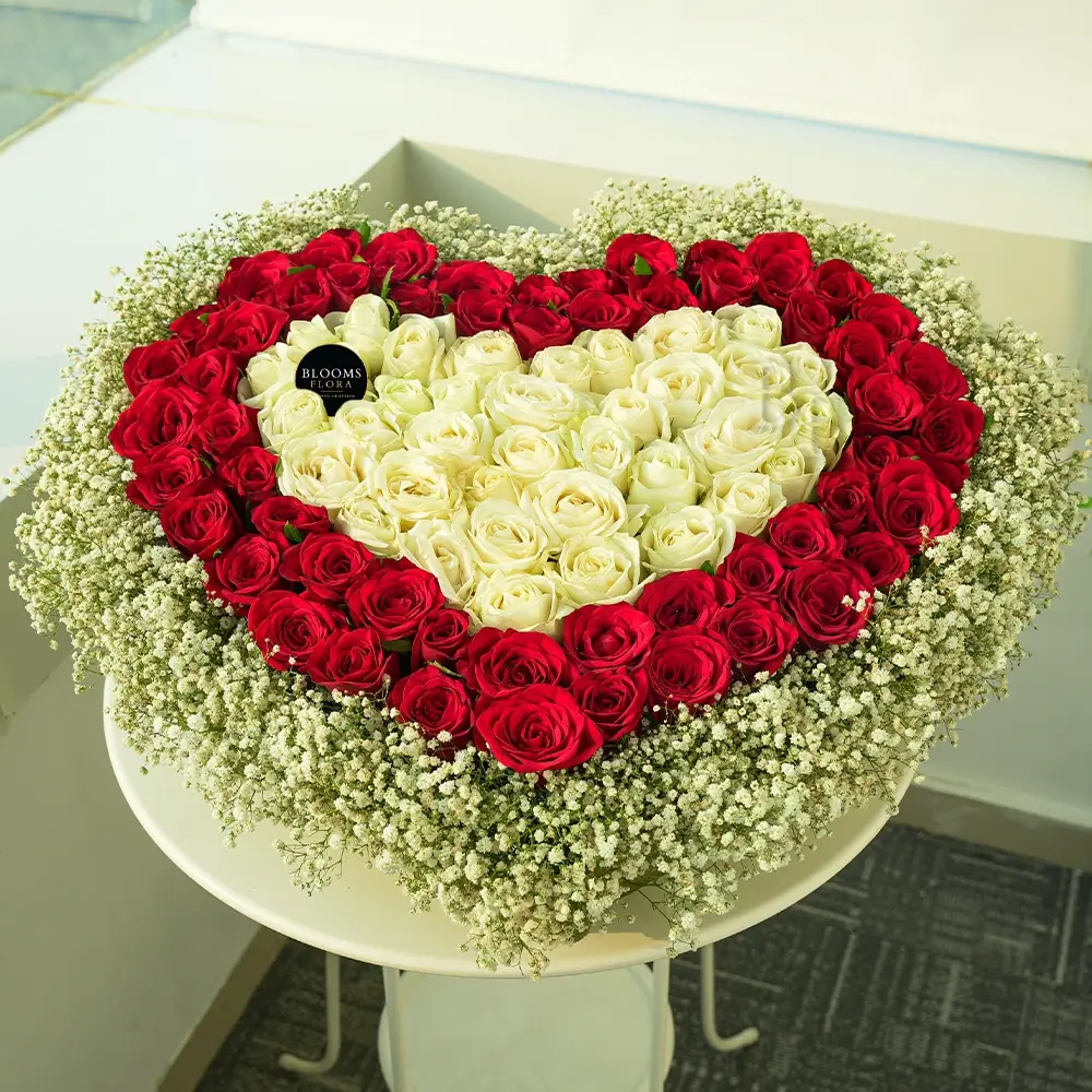 A Heart Shaped Arrangement of Red & White Roses